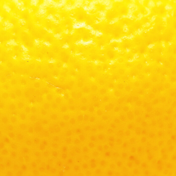 A closeup image of lemon skin