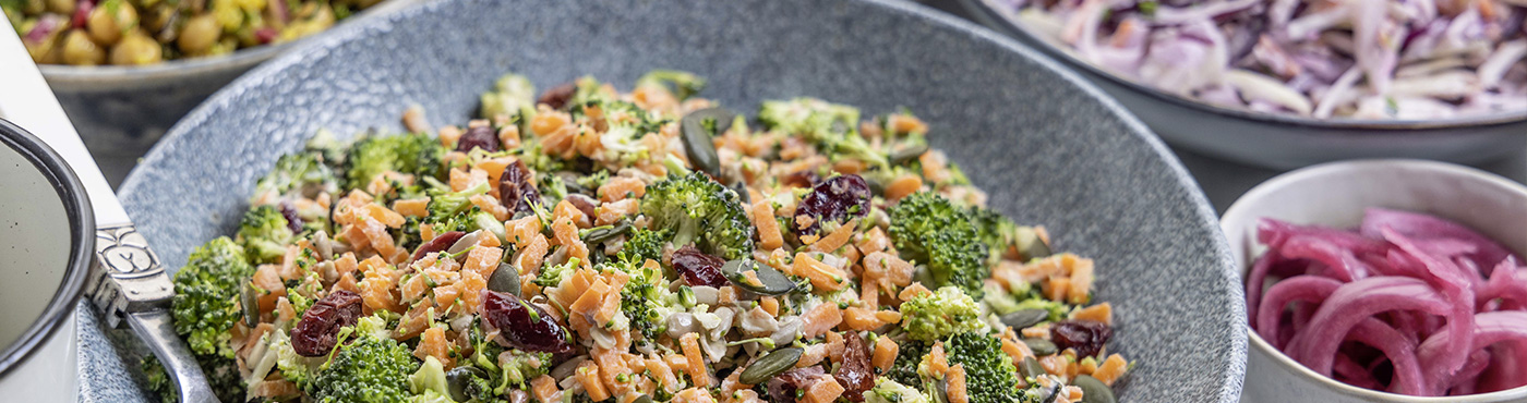 donnelly fresh foods selection of pastas & salads on a table in bowls