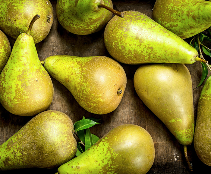 Pears on a wooden table top