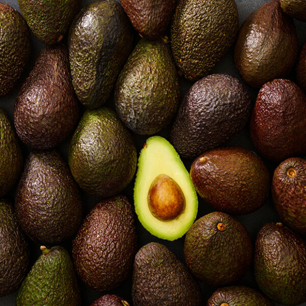 donnelly fresh Avocados, a pile of avocados with one sliced open